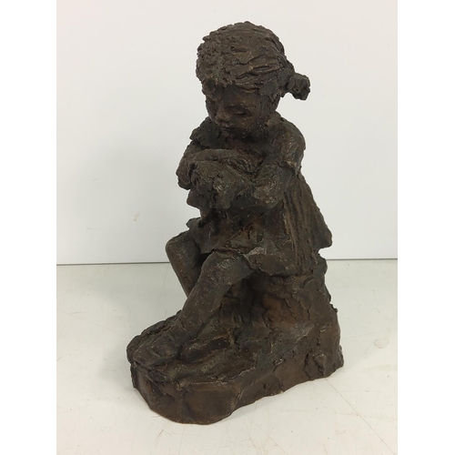 634 - Cold cast figure of a girl and dog, 18cms