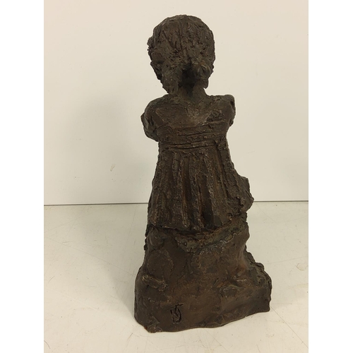 634 - Cold cast figure of a girl and dog, 18cms