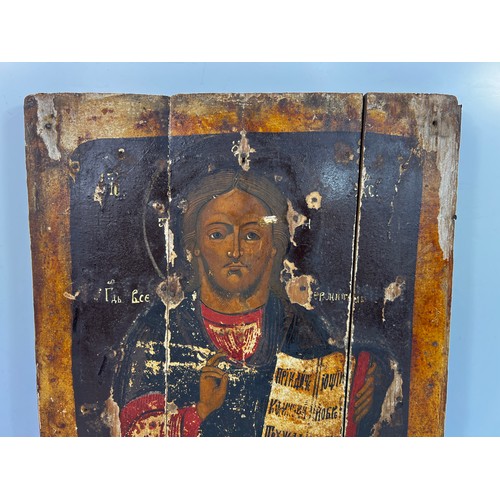 75 - Antique russian Oil painted Icon on pine with original brace bars, 30 x 26cms