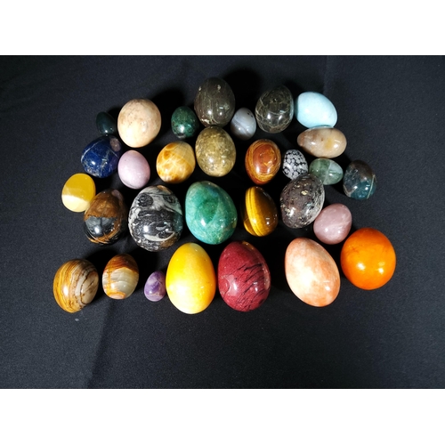 104 - Selection of various stone eggs