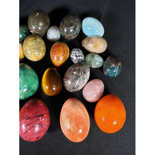 104 - Selection of various stone eggs