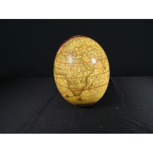 111 - Decorated Ostridge egg, 15cms in height