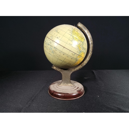 112 - Tin plate globe of the World, 20cms in height