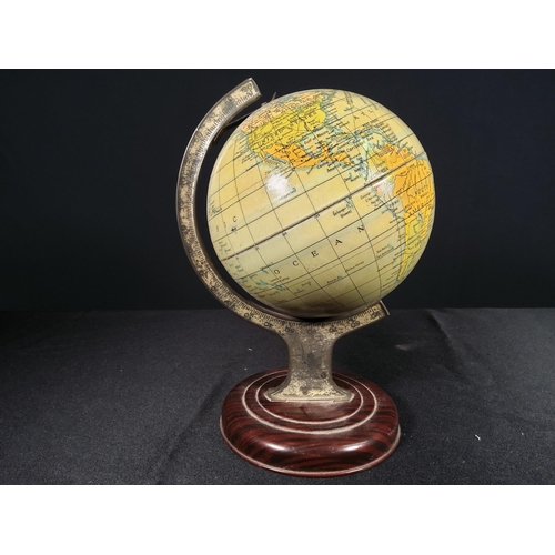 112 - Tin plate globe of the World, 20cms in height