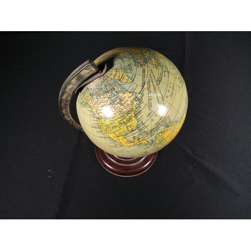 112 - Tin plate globe of the World, 20cms in height