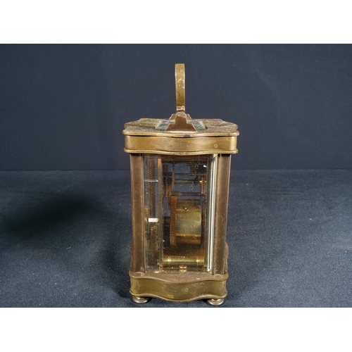 134 - Vintage brass shaped case carriage clock with enamel dial