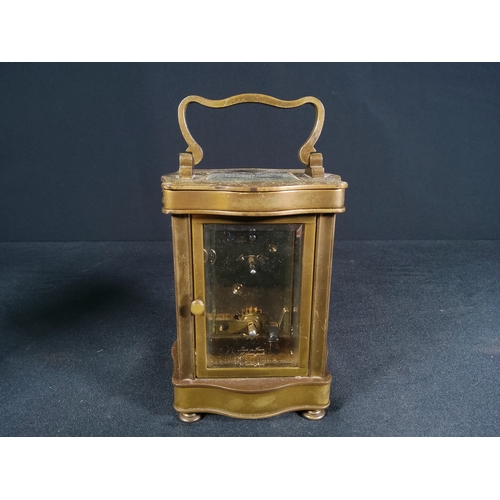 134 - Vintage brass shaped case carriage clock with enamel dial