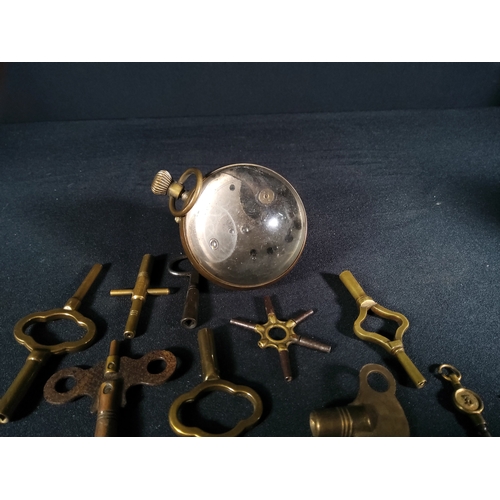 140 - Ball clock and selection of clock and watch keys, ball clock is 6cms in diameter