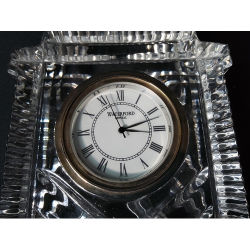 143 - 2 Waterford crystal glass clocks, largest being 11cms in height