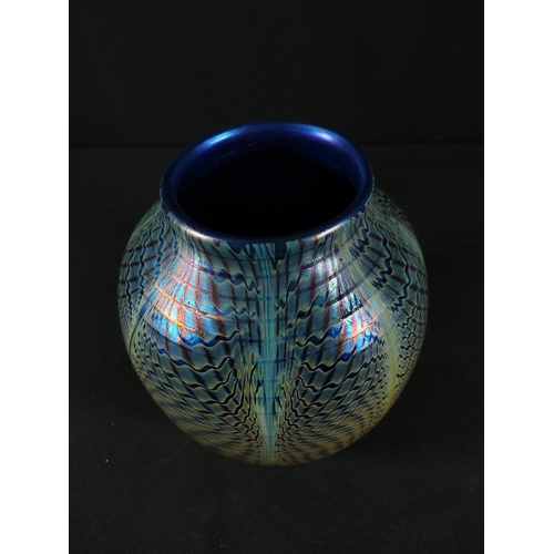 162 - Iridescent art glass vase, 14cms in height