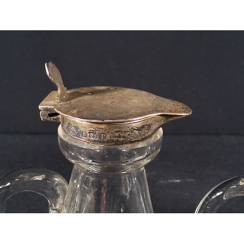 166 - 4 silver stopped jugs, 1 with crack, 10cms in height