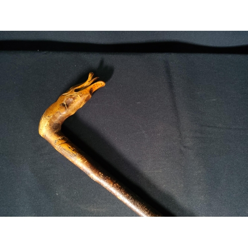 215 - Walking stick with a carved wooden duck handle