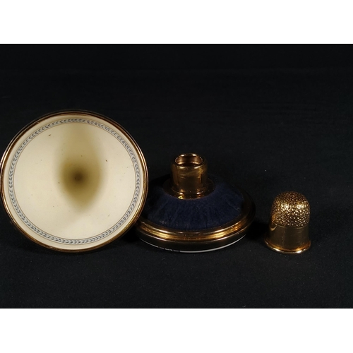 250 - Enamelled conical pot with gilded thimble interior, 8cms in height