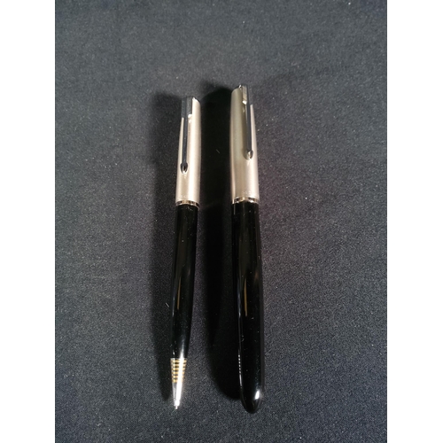 319 - Vintage boxed pair of Parker 51 pens