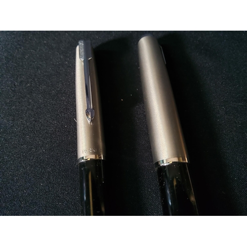 319 - Vintage boxed pair of Parker 51 pens