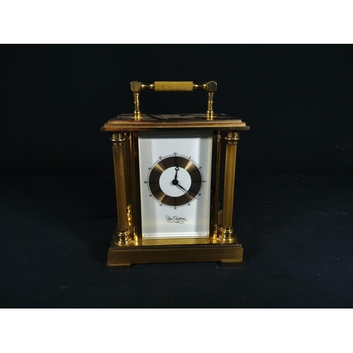 123 - Brass Column mounted carriage clock with bell movement, 12cms in height