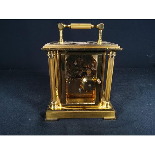 123 - Brass Column mounted carriage clock with bell movement, 12cms in height