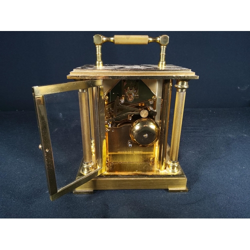 123 - Brass Column mounted carriage clock with bell movement, 12cms in height