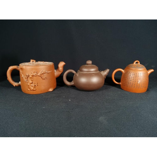 268 - 6 Oriental terracotta tea pots