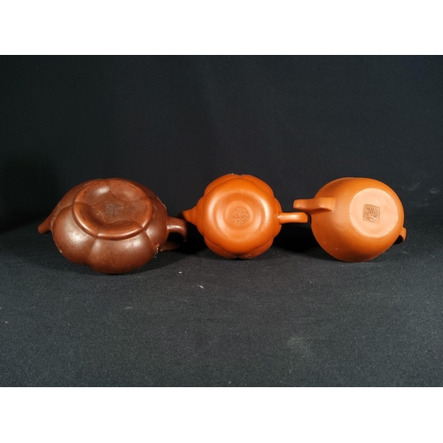 268 - 6 Oriental terracotta tea pots