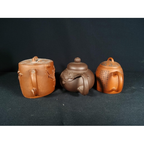 268 - 6 Oriental terracotta tea pots