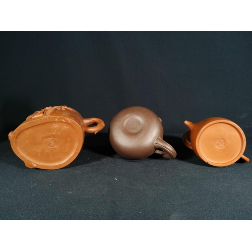 268 - 6 Oriental terracotta tea pots