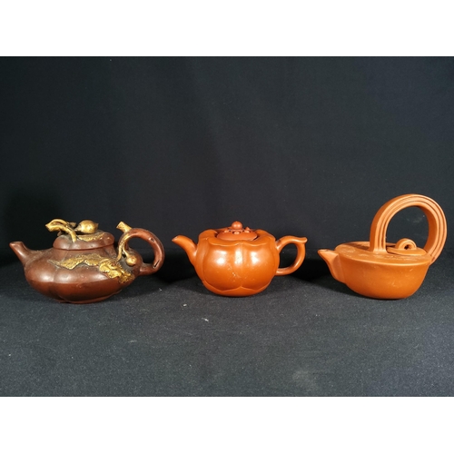 268 - 6 Oriental terracotta tea pots