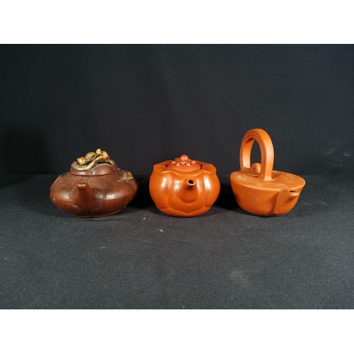 268 - 6 Oriental terracotta tea pots