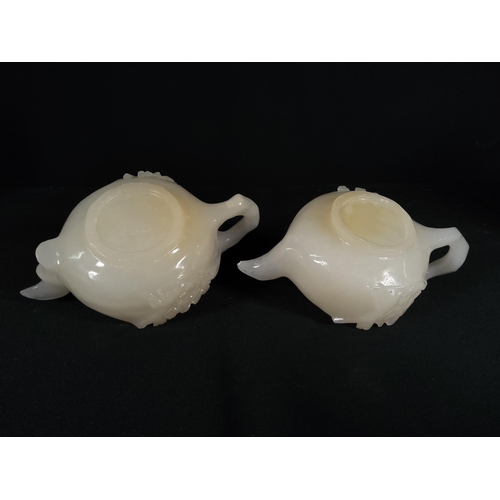 271 - 2 Oriental carved stone / Quartz teapots