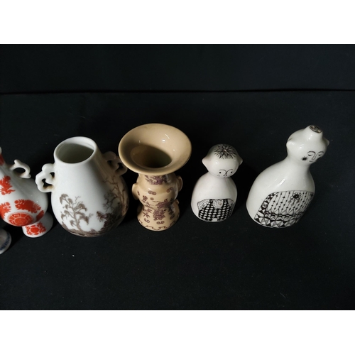 274 - Dutch pottery salt and pepper set and 5 miniature oriental vases