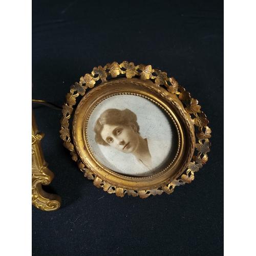 185 - 2 Antique metal framed miniatures - both gilded, one being 11 x 6cms and the other 9cms in diameter