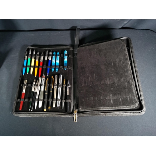 309 - Folder of 21 pens including 11 Parker