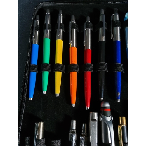 309 - Folder of 21 pens including 11 Parker