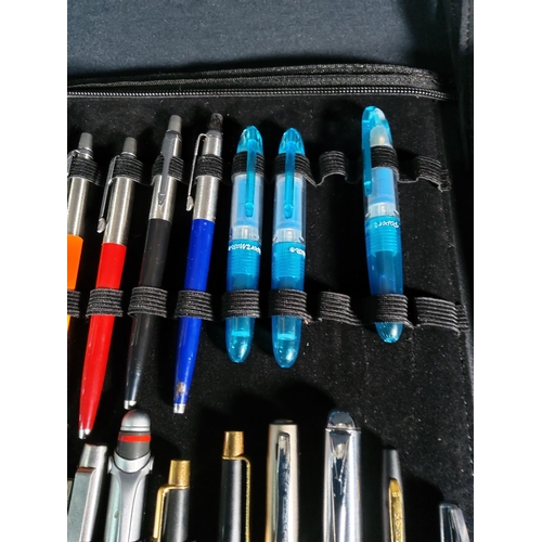 309 - Folder of 21 pens including 11 Parker