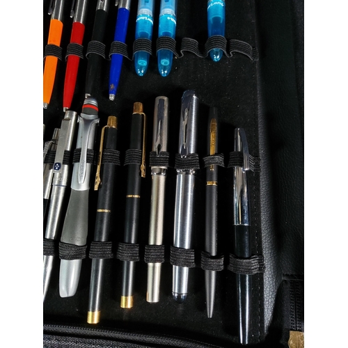 309 - Folder of 21 pens including 11 Parker