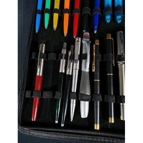 309 - Folder of 21 pens including 11 Parker