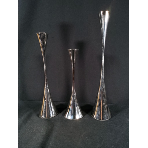 365 - 3 modern design candle sticks and horn effect candle stick, tallest being 35cms