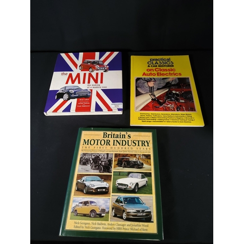 376 - Car related books & Fuel can