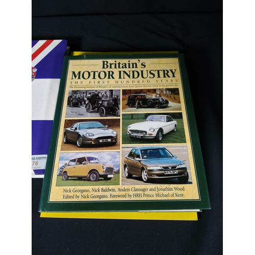 376 - Car related books & Fuel can