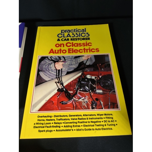 376 - Car related books & Fuel can