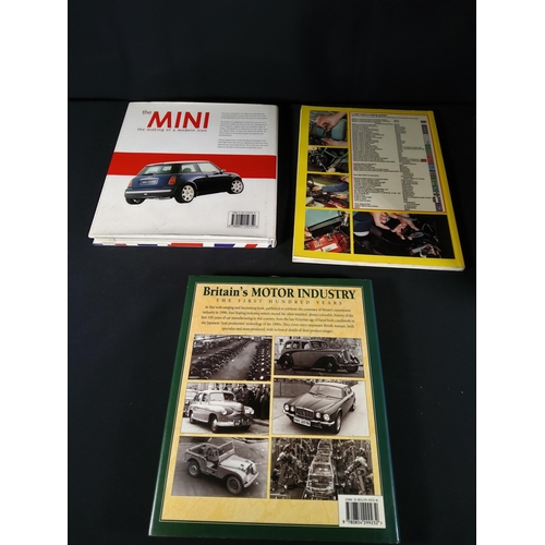 376 - Car related books & Fuel can