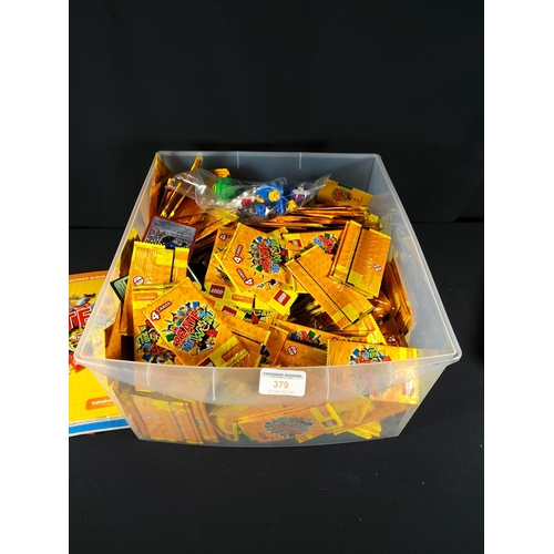 379 - Box of lego collectors cards and 2 lego books