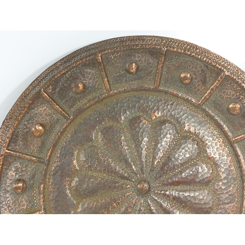 581 - Large late 19th Century copper wall charger signed to the rear and dated '95, approx 48cms in diamet... 