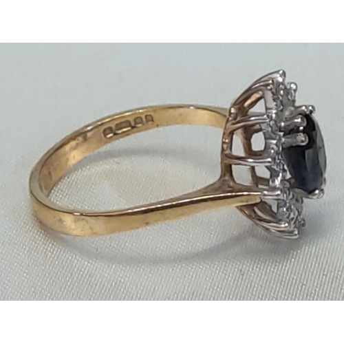 653 - 9ct gold sapphire and diamond cluster ring, size Q