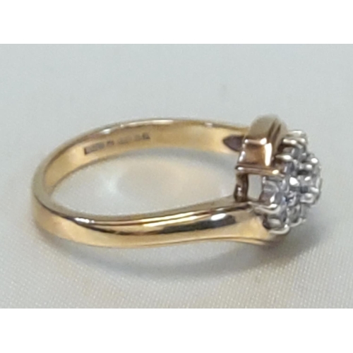 655 - 9ct gold diamond crossover ring, size N