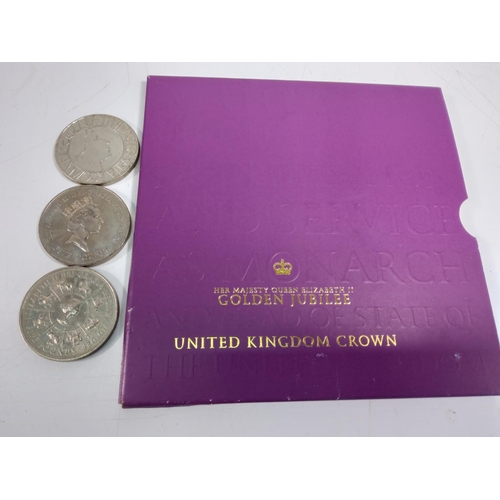 663 - Mounted Queens birthday crown, 3 other crowns and a Queen Elizabeth coin set