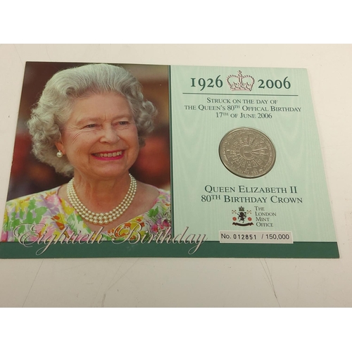 663 - Mounted Queens birthday crown, 3 other crowns and a Queen Elizabeth coin set