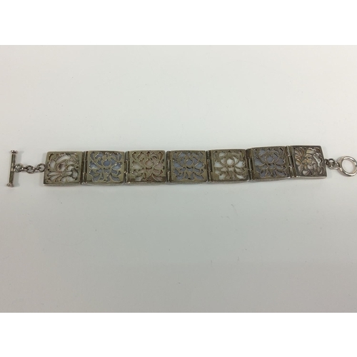 694 - Silver stone set panel bracelet