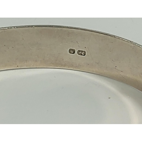 697 - Silver bangle, 36.9g