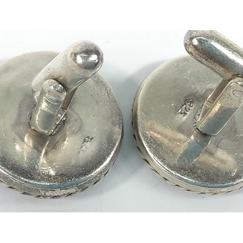 702 - A pair of cufflinks and 3 rings including silver, ring sizes N, R & Q